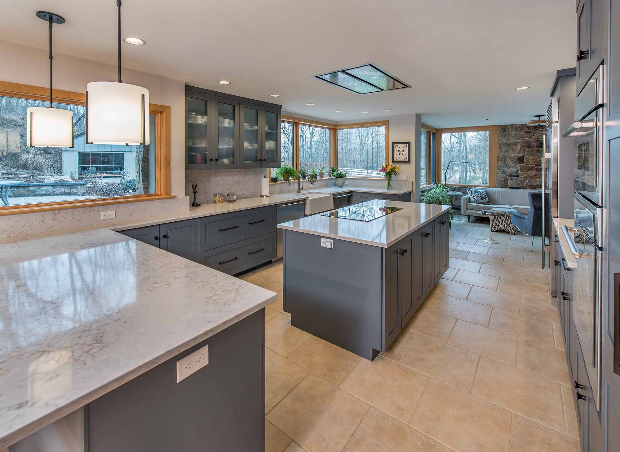 open kitchen with large island and many windows